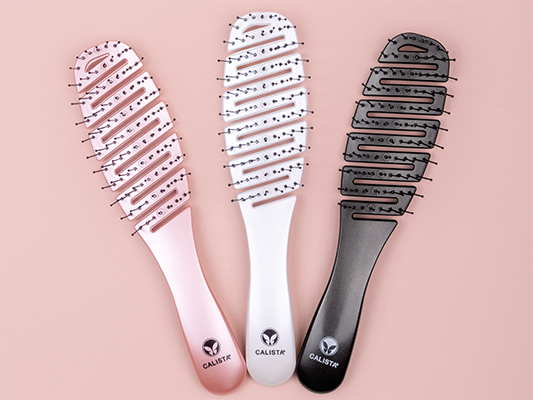 three smoothie brushes in pink, white and black