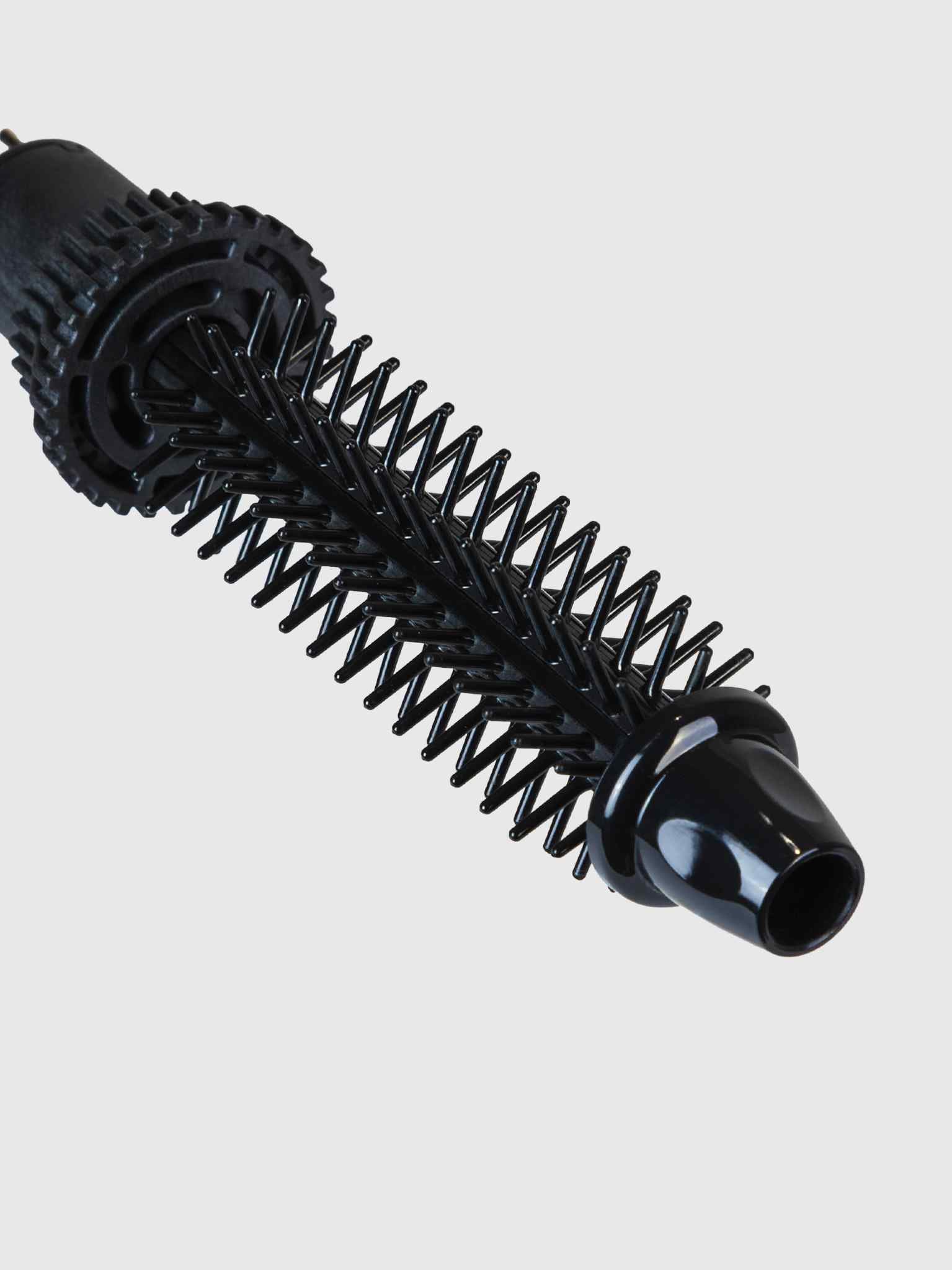 A close-up of the Calista Tools Perfecter Pro Swap Top 0.50" Brush Head, a black heated round brush with a cylindrical barrel and spiral bristles, isolated on a plain white background.