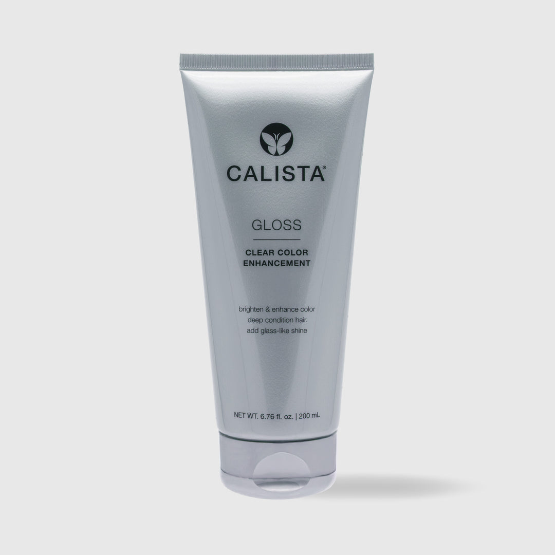 A silver tube of Calista Tools GLOSS Clear Shine Enhancement (6.76 fl oz/200 ml) stands upright on a plain light background, with the label showcasing its color enhancement and radiant shine benefits for hair.