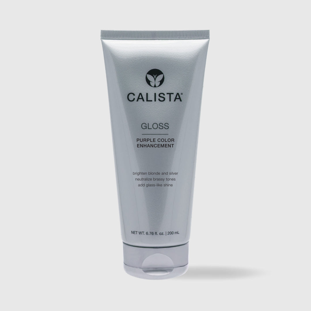 A silver tube of Calista Tools GLOSS Purple Color Enhancement, 200 ml, is upright on a light gray background. The label notes its brightening effect on blonde and silver hair, neutralizing brassy tones and adding shine.