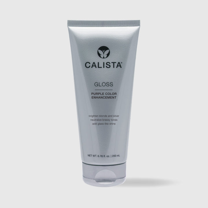 A silver tube of Calista Tools GLOSS Purple Color Enhancement, 200 ml, is upright on a light gray background. The label notes its brightening effect on blonde and silver hair, neutralizing brassy tones and adding shine.