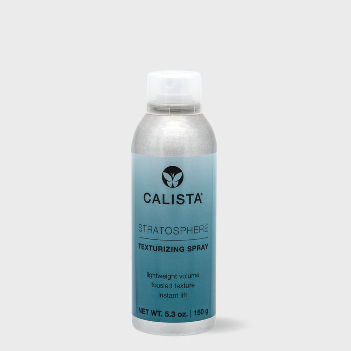 A silver and blue aerosol can of Calista Tools STRATOSPHERE Texturizer Spray, known for its lightweight, volumizing formula, features a black logo and text; it stands upright on a light gray background.