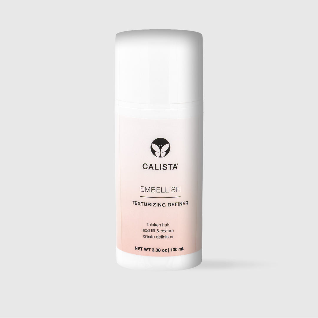 A white bottle of Calista Tools EMBELLISH Texturizing Definer Large, 3.38 oz (100 mL), featuring a black logo and text, stands upright against a plain light gray background.