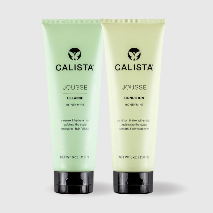 Two 8 oz (236 mL) tubes of Calista Tools JOUSSE Cleanse & Condition Duo—Cleanse Honeymint (green) and Condition Honeymint (yellow)—stand upright, featuring naturally-derived ingredients to strengthen hair follicles.