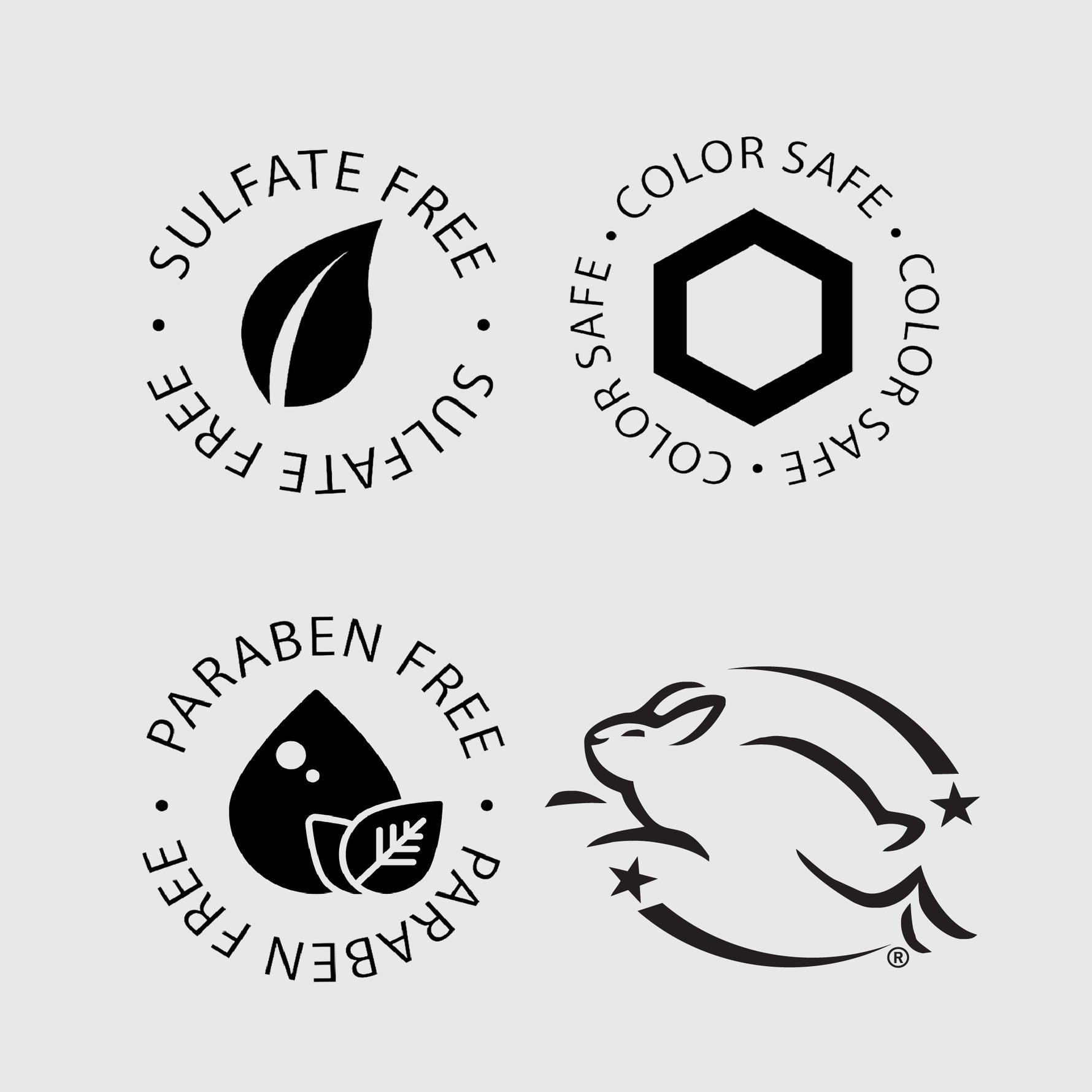 Set of four black and white icons indicating sulfate-free, paraben-free, color-safe, and animal-tested-free on a light gray background.