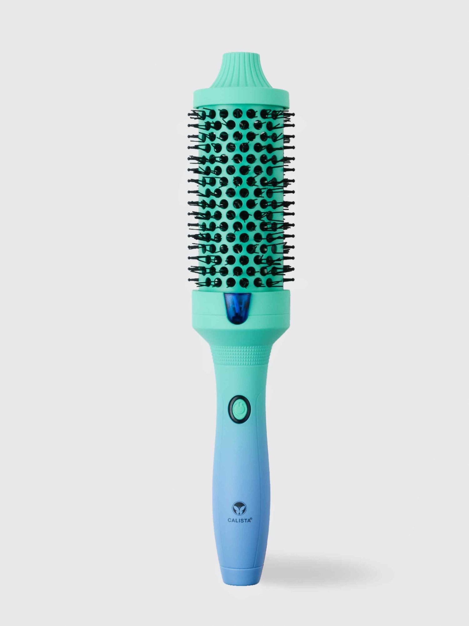 The Calista Tools Vault FAUXblo Thermal Blowout Brush 1.77" in teal and light blue features a power button and full barrel bristles, ideal for smoothing and volumizing hair, shown against a plain light background.