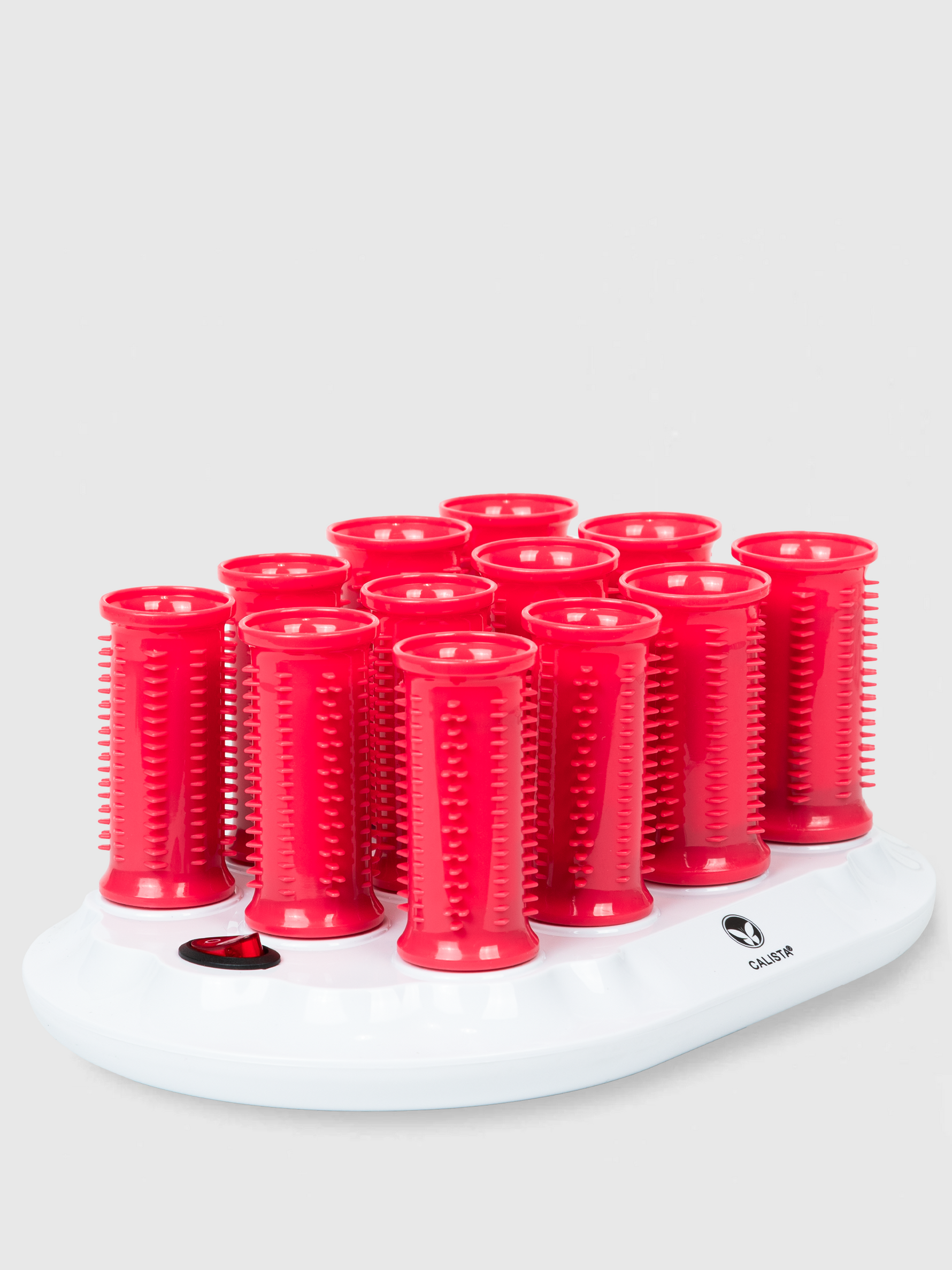 The Calista Tools Ion Hot Rollers Short Set - Gen 1 in Pink Verbena stands upright on a white base with a power button, designed for curling and volumizing hair. Final sale. Background is light gray.
