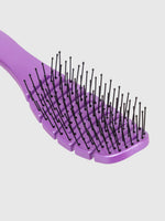 A close-up of the Calista Tools SMOOTHIE Brush, a purple vented hair brush with widely spaced bristles topped with small black tips, shown against a plain white background.