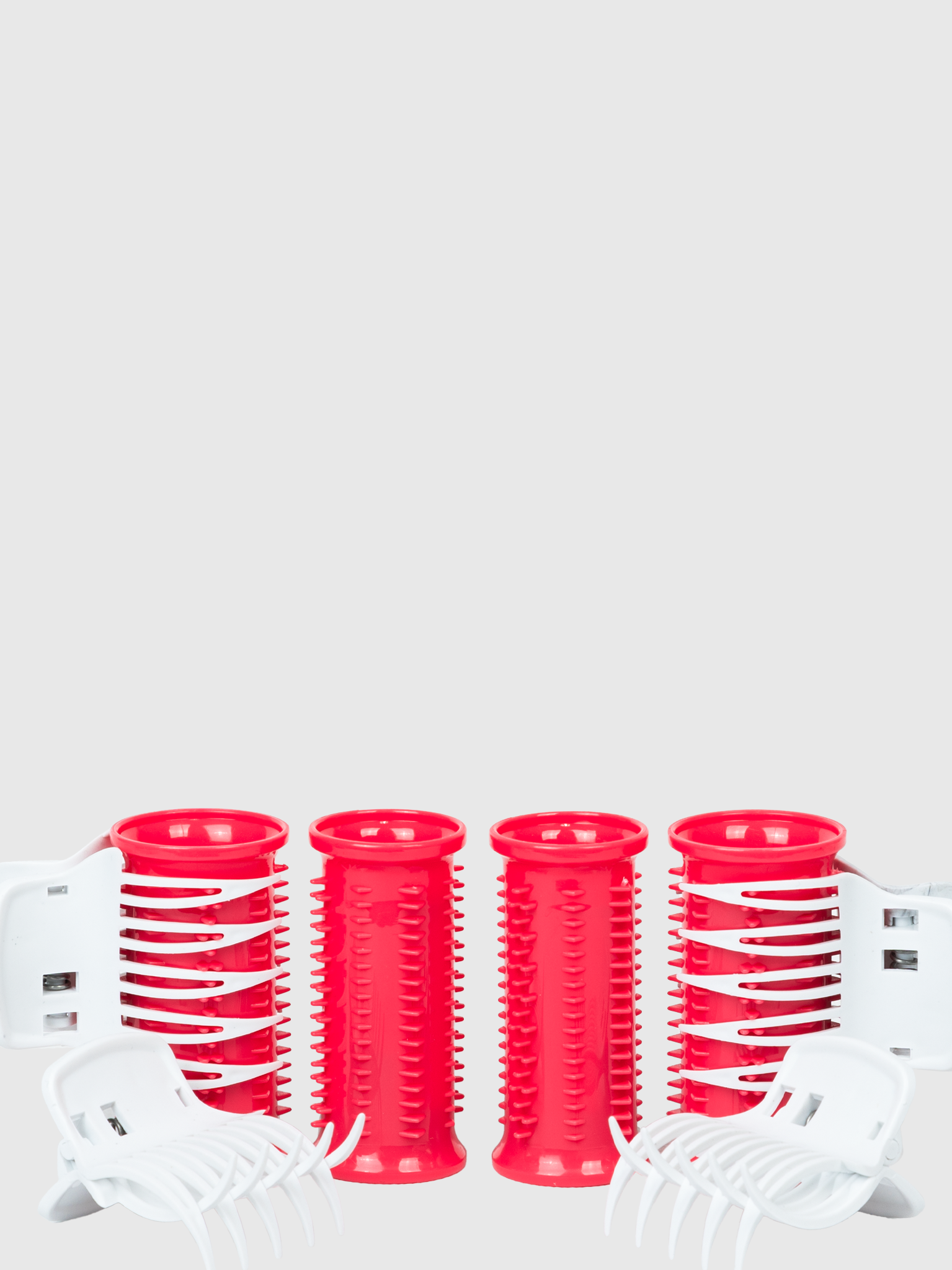 Four red Calista Tools Ion Hot Rollers Short Set - Gen 1 are arranged upright in the center, flanked by four white hair clips—all on a plain white background. Perfect for adding volume, this set is now available as a Final Sale.