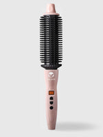 A refurbished Calista Tools Perfecter Pro Heated Round Brush with a pink handle, black-bristled cylindrical barrel, temperature controls, and on/off switch is shown upright against a white background.