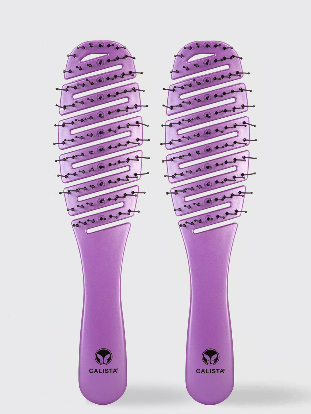 Two identical Calista Tools SMOOTHIE Brush Duo hair brushes with curved, vented detangling bristles are shown side by side against a plain light background. Each handle displays the Calista Tools logo and brand name near the base.