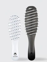 The SMOOTHIE Original + Mini Duo by Calista Tools features a white and a black vented paddle brush with branded handles, shown side by side on a light gray background. 