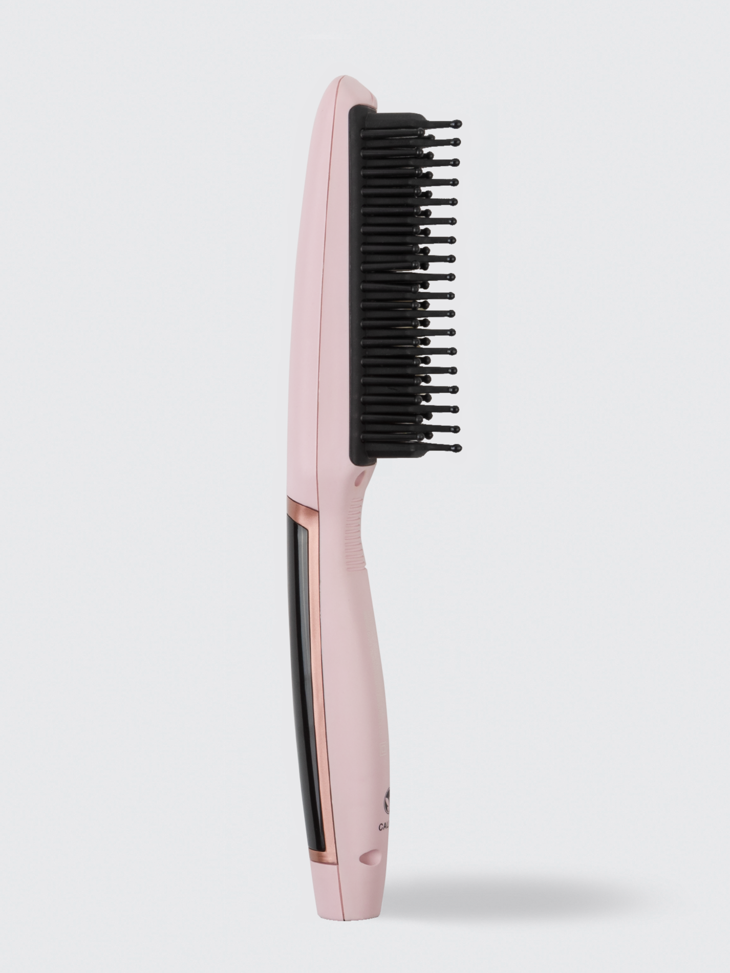 The Calista Tools Vault Triangl Pro Heated Detailer Brush, shown upright with black bristles on a pink body against a white background, is ideal for de-frizzing hair and adding smoothness.