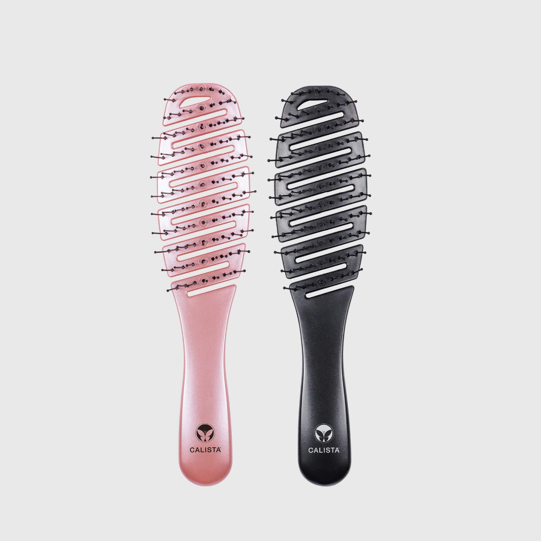 two calista smoothie brushes, one pink and one black