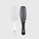 two calista smoothie brushes, one white and one black
